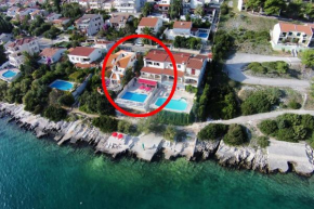 Seaside family friendly house with a swimming pool Seget Vranjica, Trogir - 10336